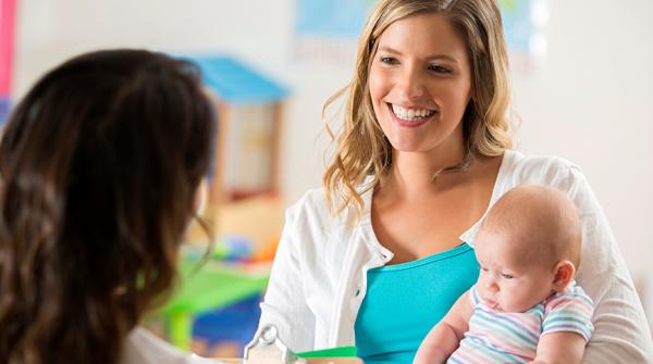 Women holding her child at an event at the Murrieta hospital.