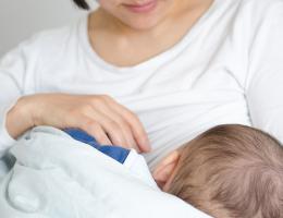 mother breastfeeding baby