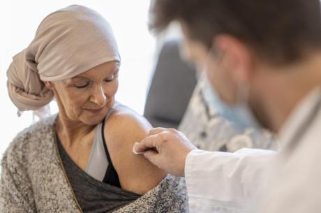 Patient with cancer receiving vaccination